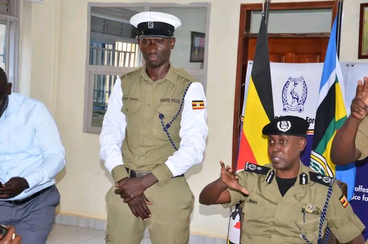 UGANDA POLICE RECOGNIZES  TRAFFIC OFFICER'S EXCEPTIONAL SERVICE DURING RAINY  DUTY